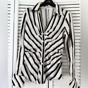 Caché brand , off white black & silver blouse bottom , size M like new